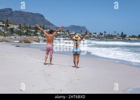 Clifton beach Cape Town South Africa, white sandy beach in Cape Town Clifton. Couple man and woman on the beach Stock Photo