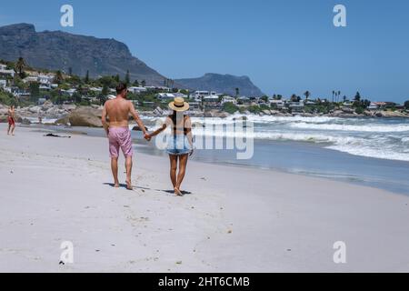 Clifton beach Cape Town South Africa, white sandy beach in Cape Town Clifton. Couple man and woman on the beach Stock Photo