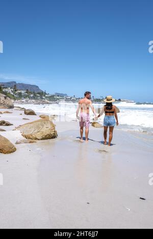 Clifton beach Cape Town South Africa, white sandy beach in Cape Town Clifton. Couple man and woman on the beach Stock Photo