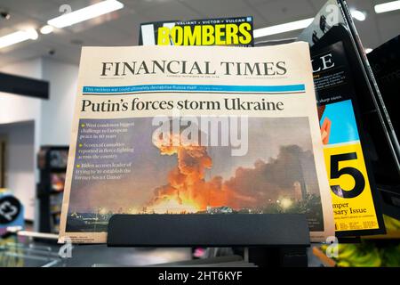 FT Financial Times newspaper headline 'Putin's forces storm Ukraine' Ukraine Russia invasion front page on newsstand 25 February 2022 London UK Stock Photo