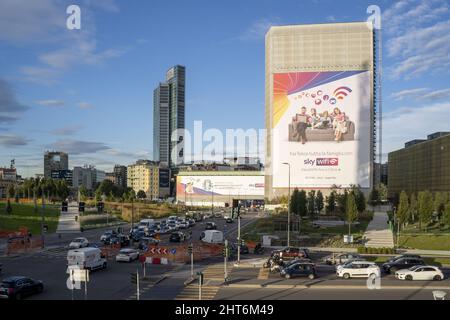Giant Sky WiFi advertising billboard on a building under construction in Porta Nuova district Stock Photo