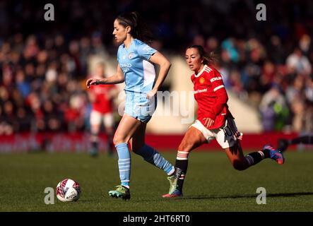 Manchester City's Vicky Losada (left) and Manchester United's Katie Zelem during the Vitality Women's FA Cup fifth round match at Leigh Sports Village, Manchester. Picture date: Sunday February 27, 2022. Stock Photo