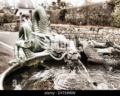 Japanese dragon fountain near a temple in Nikko, Japan Stock Photo