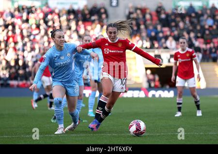 Manchester United's Katie Zelem (right) and Manchester City's Lucy Bronze during the Vitality Women's FA Cup fifth round match at Leigh Sports Village, Manchester. Picture date: Sunday February 27, 2022. Stock Photo