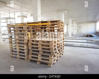Wooden pallets at construction site Stock Photo