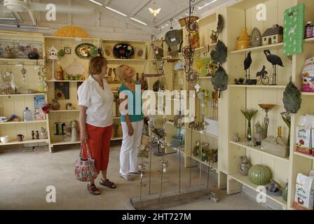 Closeup of shoppers browsing at a gift shop in Defiance, Missouri Stock Photo