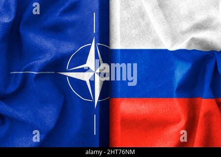 Russia and Nato flags , war background concept Stock Photo