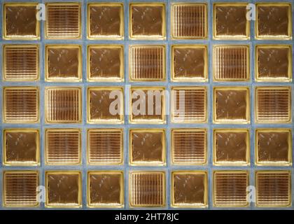 Glass block tile background. Wall in the interior of transparent glass bricks background. Interior design and decor. High quality photo Stock Photo