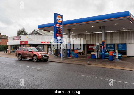 Woodbridge Suffolk UK February 19 2022: Gulf petrol station that has a Spar convenience shop located on site. Fuel prices are rising due to global con Stock Photo