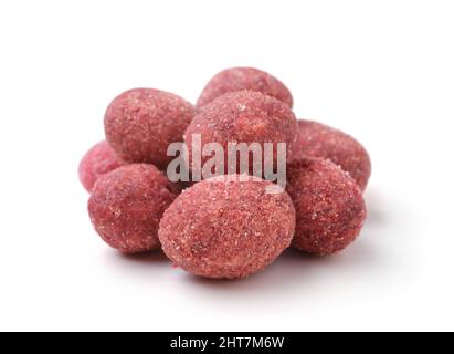 Heap of peanuts covered with spices and salt isolated on white. Stock Photo