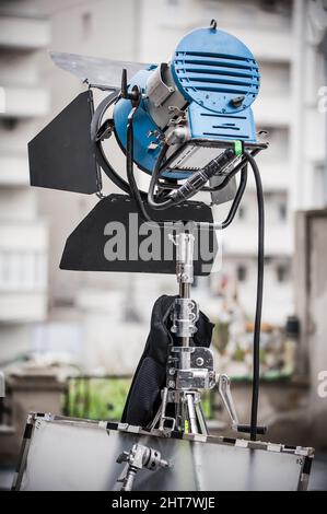 Behind the scene. Lighting equipment on the set for filming. Lights for movie film scene. Light Department. Film Crew Stock Photo