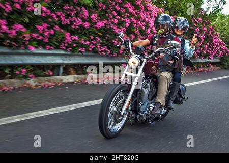 Motorcycle Riders Riding Down Road Motorcycle Riders ride down the road Stock Photo - Alamy