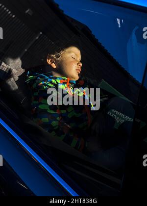 baby sleeping in car seat Stock Photo