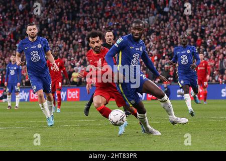 London, UK. 27th Feb, 2022. Antonio Rüdiger of Chelsea thwarts a Mohamed Salah of Liverpool effort on goal during the EFL Carabao Cup Final between Chelsea and Liverpool at Wembley Stadium, London, England on 27 February 2022. Photo by Ken Sparks. Editorial use only, license required for commercial use. No use in betting, games or a single club/league/player publications. Credit: UK Sports Pics Ltd/Alamy Live News Stock Photo