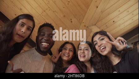 Group of happy Indian young people taking selfie Stock Photo