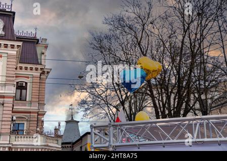 Protesters With Signs Protesters holding a banner and flags march through the streets of ...