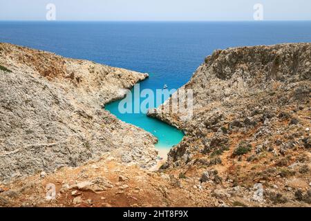 View over tourists enjoying their day on the Seitan Limani beach, Crete, Greece Stock Photo