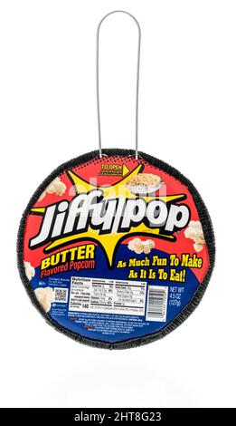 Winneconne, WI -19 February 2021: A package of Jiffy pop butter flavored popcorn on an isolated background Stock Photo