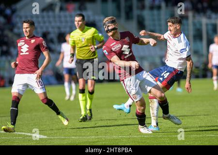 Alessandro Deiola of Cagliari Calcio, Antonio Sanabria of Torino FC, Tommaso Pobega of Torino FC,  fight for the ball during the Serie A match between Torino FC and Cagliari Calcio on February, 26th, 2022 at Stadio Grande Torino in Torino, Italy. Picture by Antonio Polia/Alphapress Stock Photo