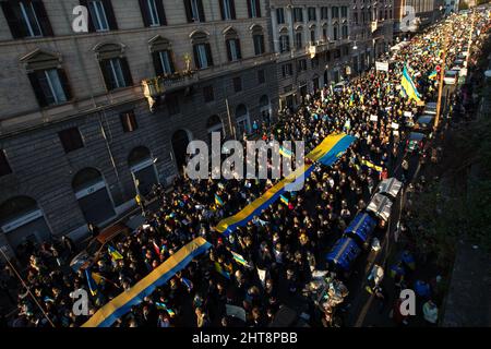 Rome, Italy. 27th Feb, 2022. Today, thousands of people gathered in Piazza della Repubblica and marched to the Fori Imperiali in central Rome to show support and solidarity with the Ukrainian people and to call for immediate peace in Ukraine. The war against Ukraine - and the consequent Russian invasion - was declared in the early morning of the 24th February 2022 by the President of the Russian Federation, Vladimir Putin. Credit: LSF Photo/Alamy Live News Stock Photo