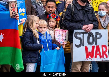 Valencia, Spain; 27th Feb 2022: Demonstrators protest against the war during a demonstration against Russia's invasion of Ukraine. Some children were also present. Credit: Media+Media/Alamy Live News Stock Photo