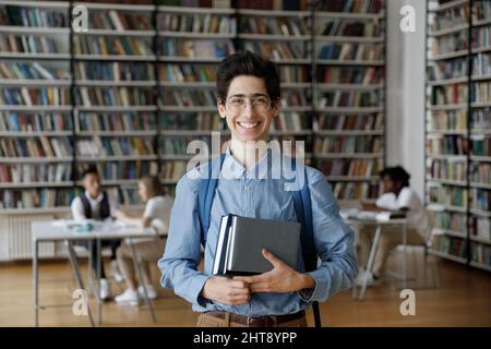 Portrait of smiling millennial Jewish male student. Stock Photo
