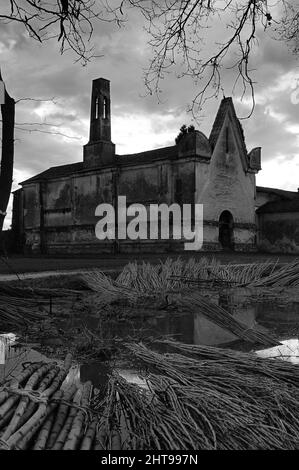A grayscale of an old creepy stone building Stock Photo - Alamy