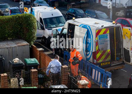 London. UK-02.23.2022. Workers from the utility company Thames Water carrying out repair and maintenance work on the pavement. Stock Photo