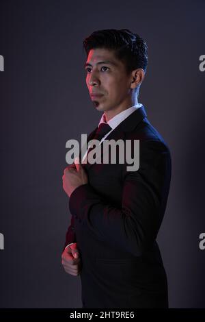 Asian male tango ballroom dancer in suit Stock Photo