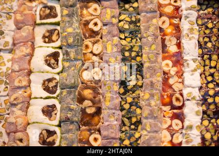 Load of traditional turkish delight lokum sugar coated soft candy Stock Photo