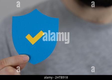 A person presenting a virtual projection of cybersecurity Stock Photo