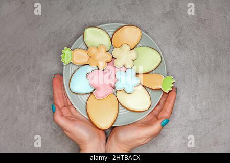 Beautiful glazed Easter cookies. Easter festive table setting. Stock Photo