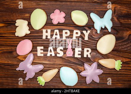 Easter background with colorful cookies in the shape of eggs . Stock Photo