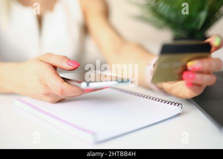 Lady doing outpayment Stock Photo