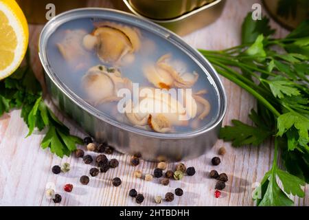 Canned seafood, whole shelled clams Stock Photo