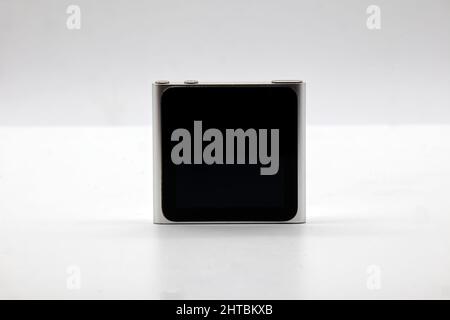 Apple Ipod Nano isolated on white background. Vintage technology Stock Photo