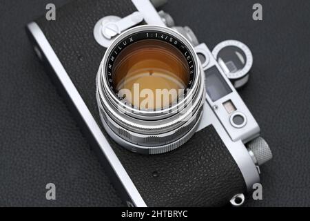 Kagawa, Japan - February 27, 2022: Leica ⅢG rangefinder camera with Leitz 50mm f1.4 Summilux L-mount lens. Vintage collectible classic lens concept. Stock Photo