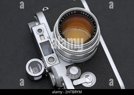 Kagawa, Japan - February 27, 2022: Leica ⅢG rangefinder camera with Leitz 50mm f1.4 Summilux L-mount lens. Vintage collectible classic lens concept. Stock Photo