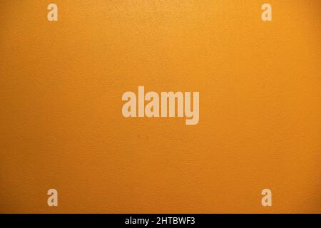 Yellow cement wall for texture and surface background Stock Photo
