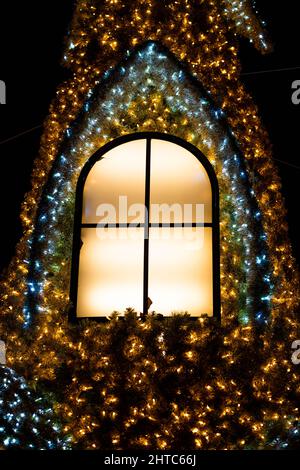 Vertical shot of Christmas decorations in Constanta city park - Romania. Stock Photo