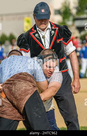 Swiss wrestlers fighting at the NOS 2012 in Silvaplana, Switzerland Stock Photo