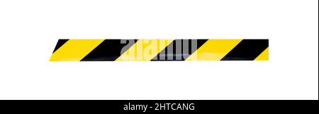 Piece of warning  yellow black tape isolated in white Stock Photo
