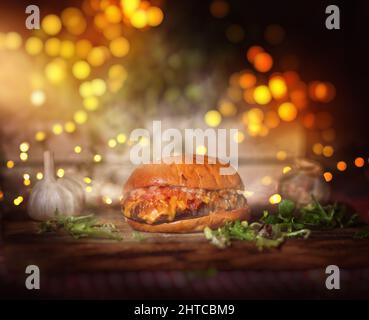 delicious and tasty burger with cheese and lettuce Stock Photo