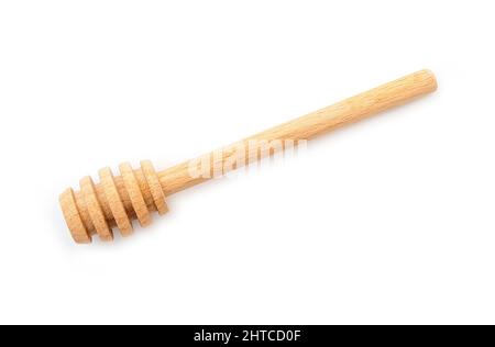 Honey dipper spoon isolated on white Stock Photo