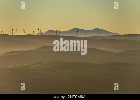 Vale of Clwyd wind turbines with Snowdon mountain in the background, North Wales Stock Photo