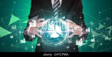 Businessman holdig business icons concept Stock Photo