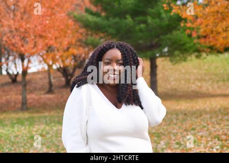 Cheerful middle-aged black lady at Liberty State Park in Jersey City, New Jersey, the USA Stock Photo