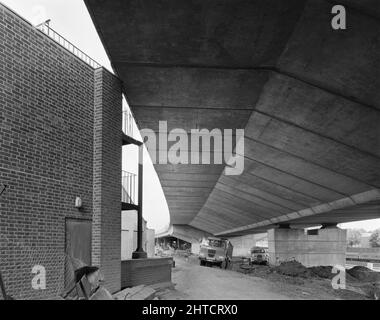 Westway Flyover, A40, Paddington, City of Westminster, London, 09/07/1970. A view of the Westway Flyover from below, showing where the deck almost touches the corner of a building on Torquay Street. Work on site for the Western Avenue Extension began on 1st September 1966, and the Westway as it became known was officially opened on 28th July 1970. The elevated highway connecting the A40 at White City to Marylebone Road in Paddington, at around 2 &#xbd; miles, was the longest in Europe. Consulting engineers G Maunsell &amp; Partners designed the road project for the Greater London Council and J Stock Photo