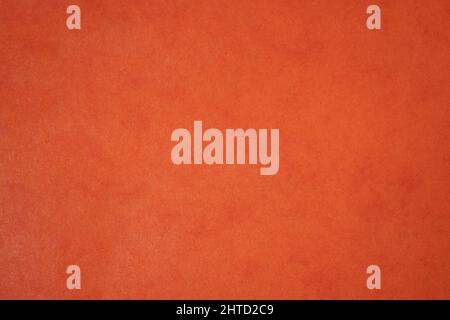 bright orange textured paper background. recycled eco-friendly paper Stock Photo