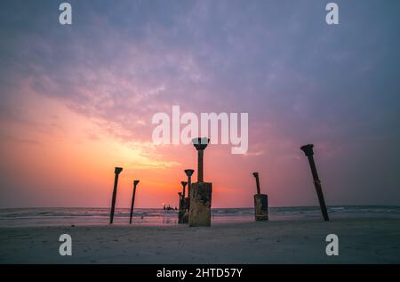 colorful beach sunset view from Kozhikode beach, beautiful cloudy sky with beach scenery Stock Photo